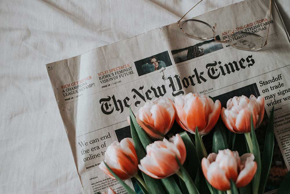 Newspaper with roses on top