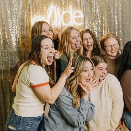 Women making funny faces at Collide Conference.