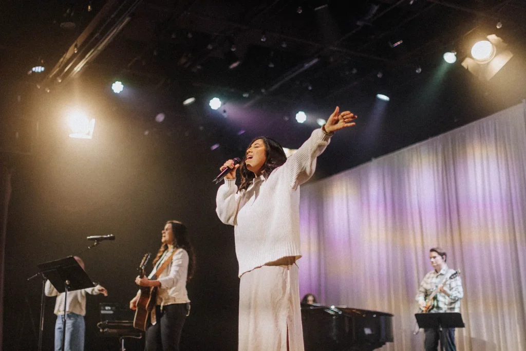 Collide conference woman singing.